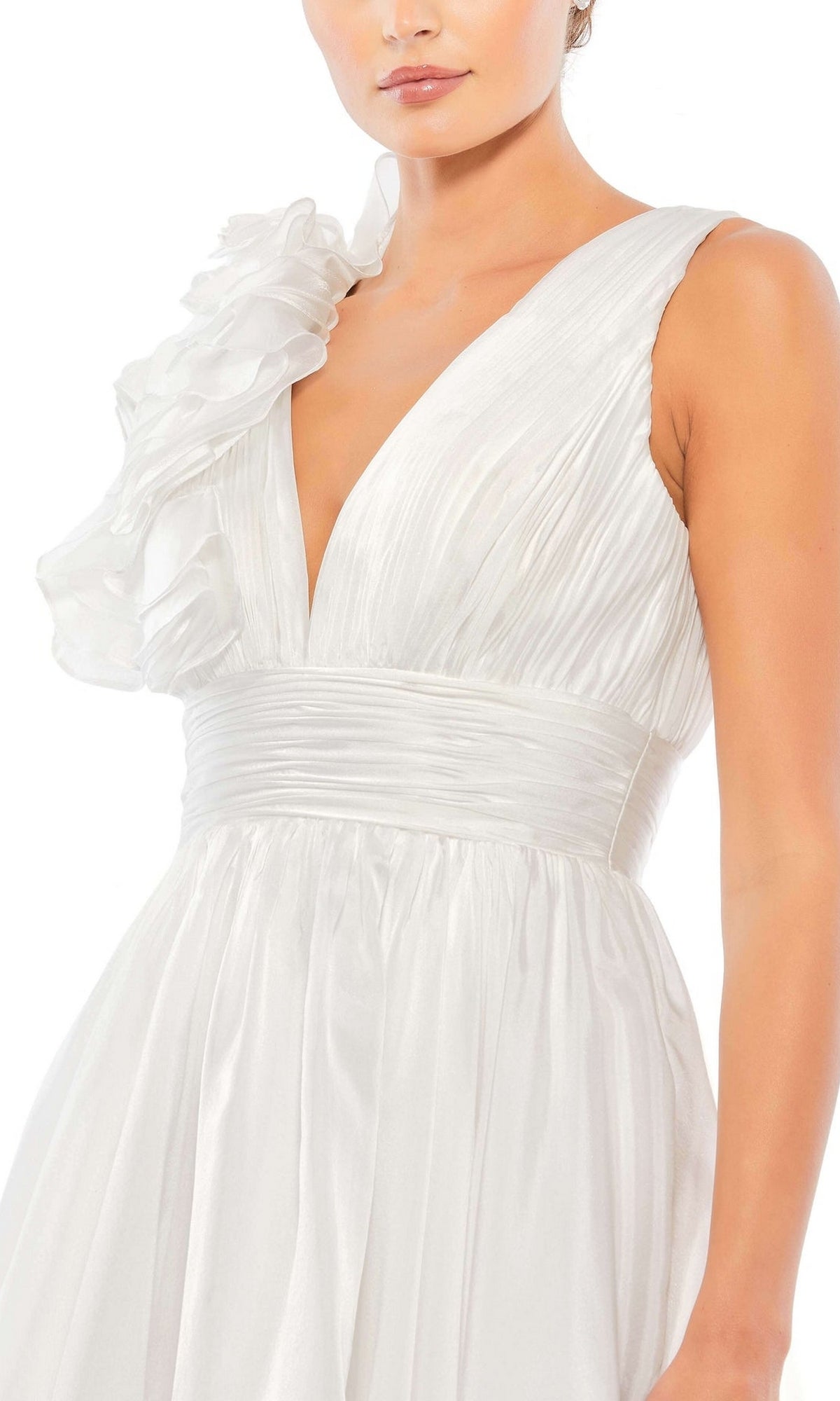 A woman wears the Ruffle Short White Party Dress: Mac Duggal 48952, a sleeveless A-line cocktail dress featuring a deep V-neckline, pleated bodice, wide waistband, and ruffled one-shoulder detail.